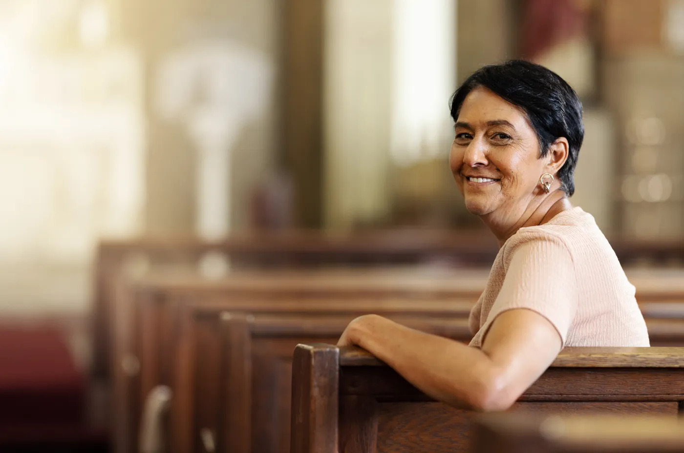 Woman sitting in pew at St. Gabriel's Episcopal